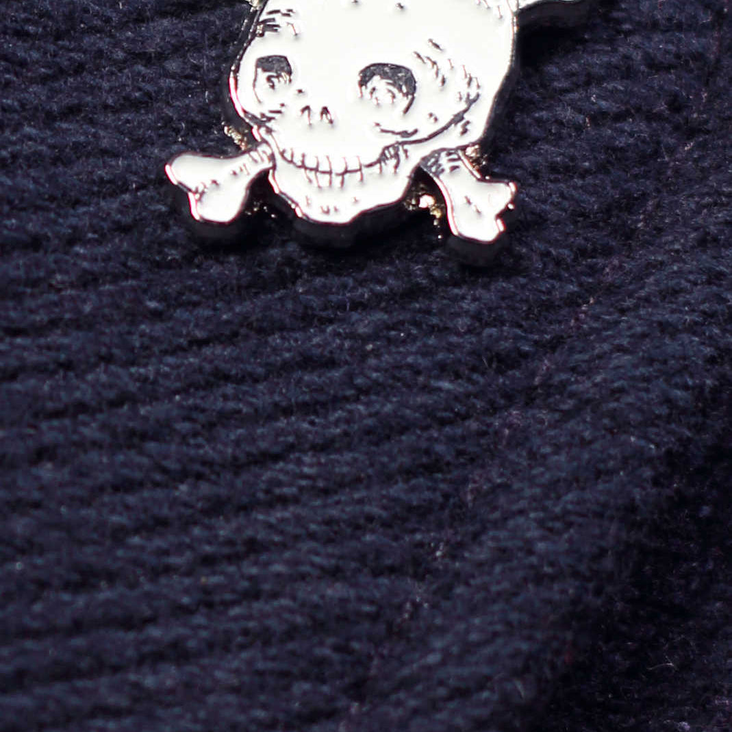 White skull enamel lapel pin